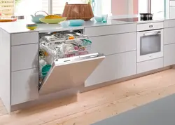 Dishwasher in the kitchen under the countertop photo