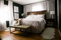 Bed with feet to the window in the bedroom photo