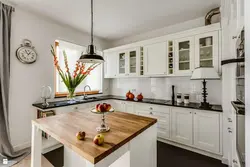 Kitchen with island in Scandinavian style photo