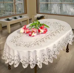 Tablecloth on an oval table for the kitchen photo