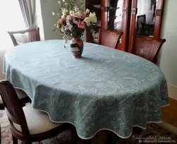 Tablecloth on an oval table for the kitchen photo