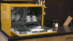 Ас үй интерьеріндегі үстел үсті ыдыс жуғыштың фотосы