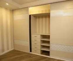 Wardrobe in the hallway on the entire wall photo