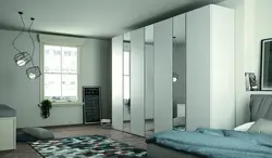 Hinged wardrobes with a mirror in the bedroom photo