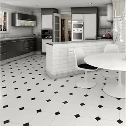 Black tiles on the kitchen floor photo