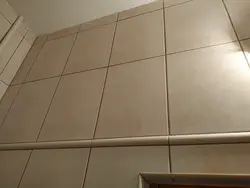 Banyoda Fotoşəkildə Bej Plitələr Üçün Palçıq
