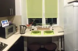 Table by the window in the kitchen photo Khrushchev