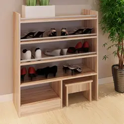 Wooden shoe rack in the hallway photo