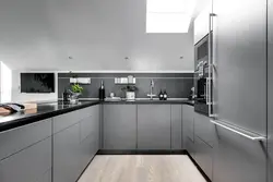 White kitchen with dark gray countertop photo