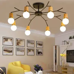 Chandeliers дар меҳмонхона дар акс сабки Скандинавия