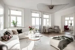Chandeliers дар меҳмонхона дар акс сабки Скандинавия