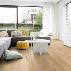 Laminate Flooring For The Living Room With Light Wallpaper Photo