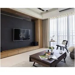 TV On A Black Wall In The Living Room Photo