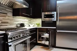 Photo Of Kitchen With Stove And Refrigerator Photo