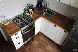 Photo of kitchen with stove and refrigerator photo