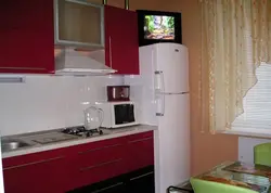 TV in the kitchen in a small kitchen photo