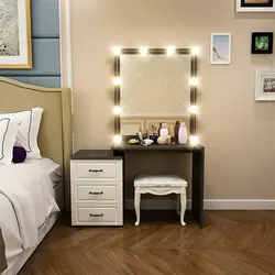 Mirror with a nightstand in the bedroom photo