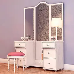 Mirror with a nightstand in the bedroom photo