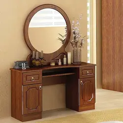Mirror with a nightstand in the bedroom photo