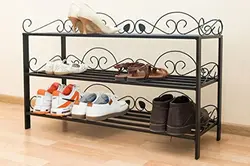 Photo of metal shoe racks in the hallway