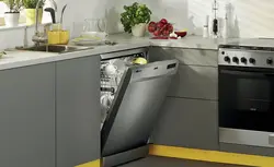 Built-in dishwasher in the kitchen interior photo