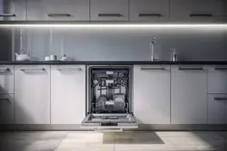 Built-in dishwasher in the kitchen interior photo