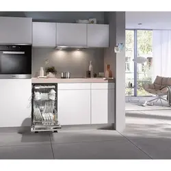 Built-in dishwasher in the kitchen interior photo