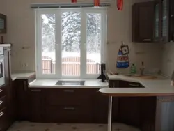 Kitchen along the window photo for a small kitchen