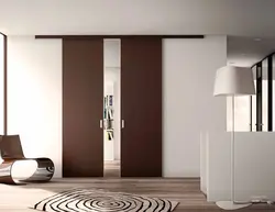 Interior double-leaf sliding doors in the living room interior photo