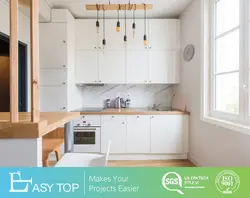 Пешдомани мармарӣ ва countertop чӯбӣ дар акс ошхона