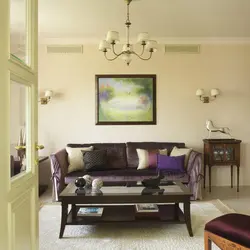 Sconce on the wall in the living room above the sofa photo