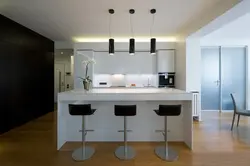 Hanging lamps above the bar counter in the kitchen photo