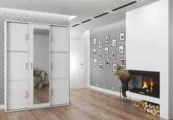 White wardrobe in the hallway with a mirror photo