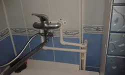 Смеситель из ванны а не из стены фото