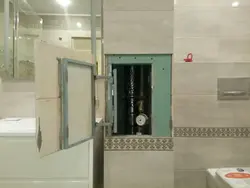 How to hide a hatch in a bathroom with tiles photo