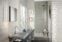 Combination of glossy and matte tiles in the bathroom photo