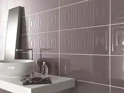 Combination of glossy and matte tiles in the bathroom photo
