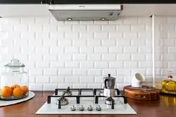 Kitchen Apron Made Of White Brick Tiles Photo