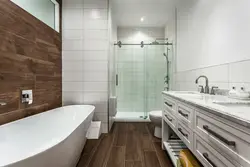 Tiles under laminate in the bathroom photo on the wall
