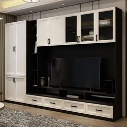 Wall cabinet in the living room with space for a TV photo