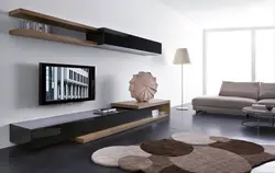 TV console in a modern style in the living room photo