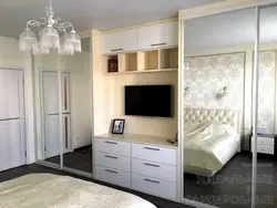 Wardrobe and chest of drawers in the bedroom in the same style photo