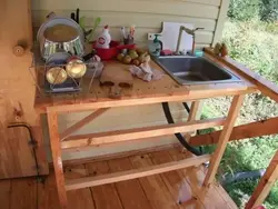 DIY kitchen in the country from scrap materials photo