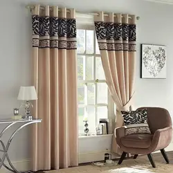 Tulle on grommets in the living room in a modern style photo