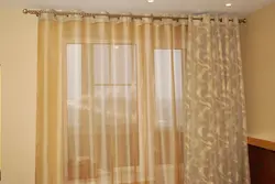Tulle on grommets in the living room in a modern style photo