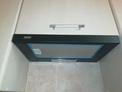 Built-in kitchen hood with ventilation outlet photo