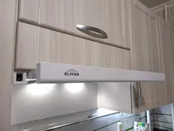 Built-in kitchen hood with ventilation outlet photo