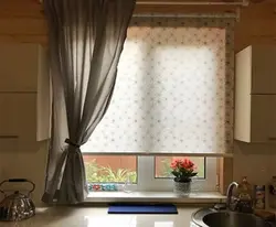 Blinds and curtains on one window in the kitchen photo
