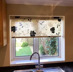 Blinds and curtains on one window in the kitchen photo