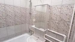 Фотосурет арқылы ылғалдың өтуіне жол бермейтін плиткалардың астындағы ванна бөлмесіне арналған панельдер
